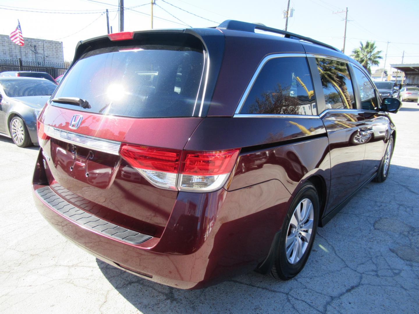 2016 Red /Tan Honda Odyssey EX-L (5FNRL5H62GB) with an 3.5L V6 SOHC 24V engine, Automatic transmission, located at 1511 North Shepherd Dr., Houston, TX, 77008, (281) 657-1221, 29.798361, -95.412560 - 2016 HONDA ODYSSEY EX-L VIN: 5FNRL5H62GB103369 5 F N R L 5 H 6 2 G B 1 0 3 3 6 9 VAN 3.5L V6 F SOHC 24V GASOLINE FRONT WHEEL DRIVE - Photo#37